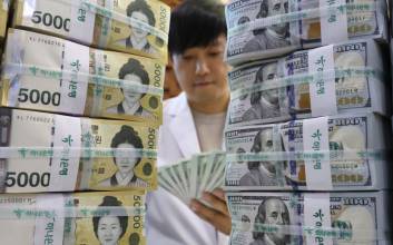 원/달러 환율, 달러 강세 진정에 1460원 선에서 등락